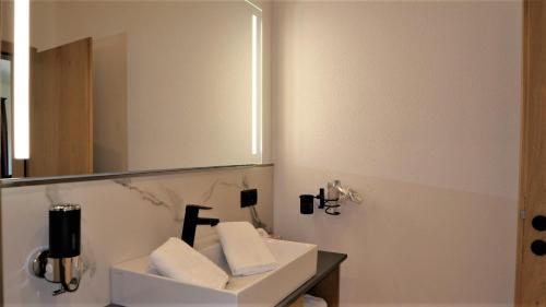 Appartements Plusにあるバスルーム