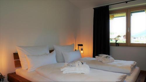 Appartements Plusにあるベッド