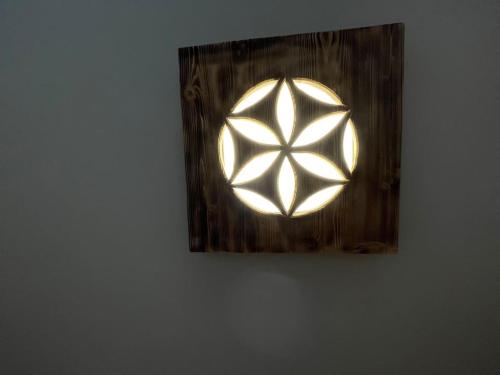 a picture of a light on a wall at Apartament u Bafiów in Chochołów