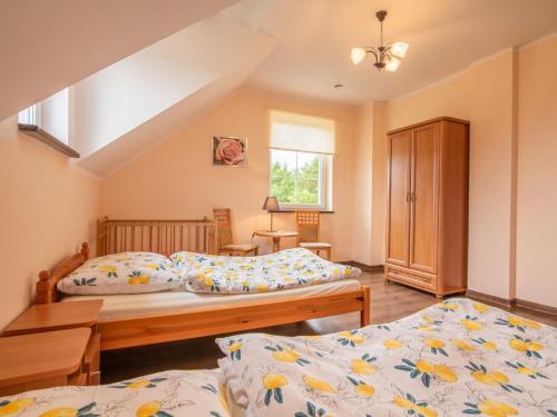 Tempat tidur dalam kamar di Holiday Home Villa von Valdi by Interhome