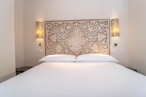 Postel nebo postele na pokoji v ubytování Aljarafe Suites by QHotels