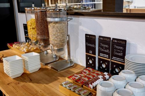 a counter with some food on a table at Doña Lola in Castellón de la Plana