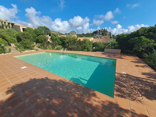 an image of a swimming pool in a yard at Villa cesar in Costa Paradiso