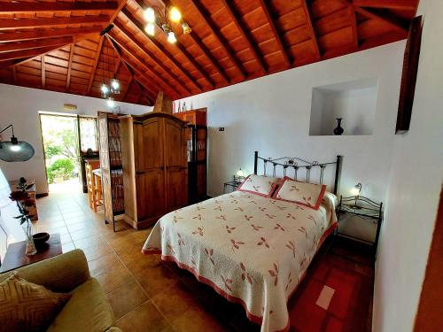 מיטה או מיטות בחדר ב-Las Toscas