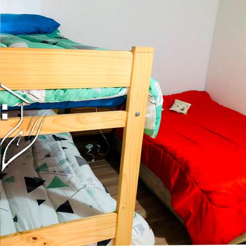 Una cama o camas cuchetas en una habitación  de Alojamiento Gonzalez Paz