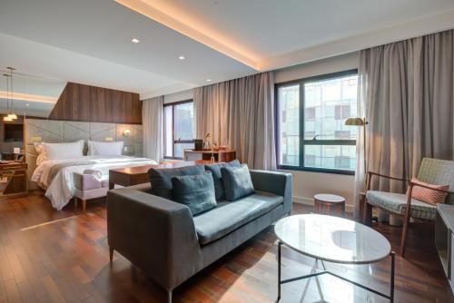 Cama ou camas em um quarto em Qoya São Paulo Paulista, Curio Collection by Hilton