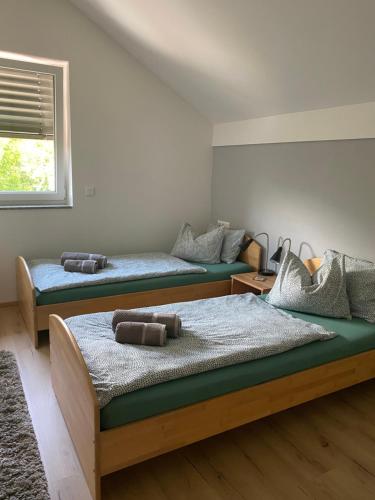 Un pat sau paturi într-o cameră la Arcana