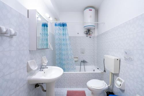 Koupelna v ubytování Cozy Apartment 2
