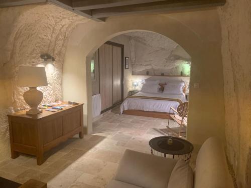 Ένα ή περισσότερα κρεβάτια σε δωμάτιο στο La réserve Stanislas & SPA