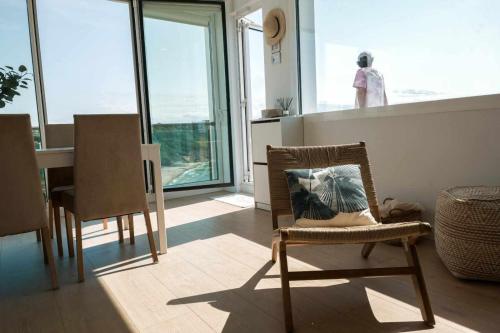 Χώρος καθιστικού στο Apartamento Sunset con vistas Playa de Los Locos