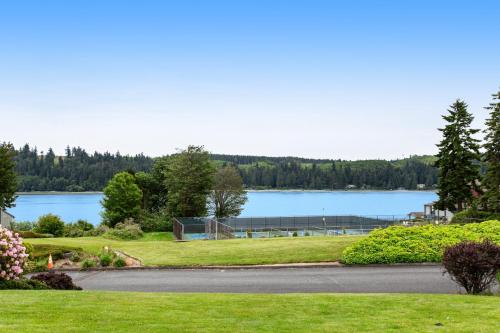 a view of a lake from a park at Ludlow Seaside Hale' in Port Ludlow