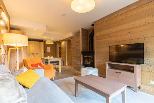 TV o dispositivi per l'intrattenimento presso Résidence l'Hévana - Appartements de Prestige Méribel Centre