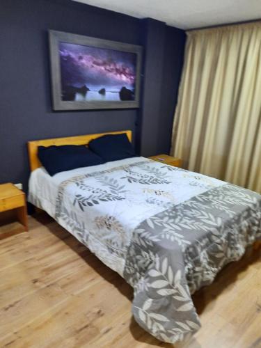 מיטה או מיטות בחדר ב-Hospedaje Aguaclara