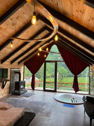 Postel nebo postele na pokoji v ubytování Afara Bungalows Otel & Cafe