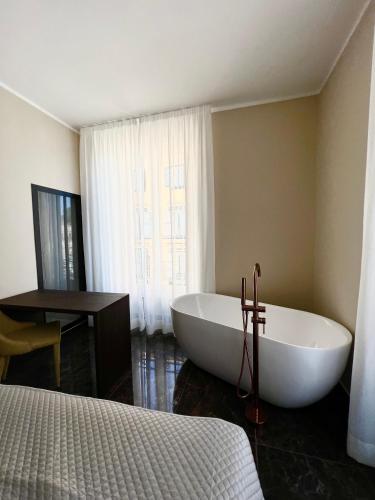 Letto o letti in una camera di Viminale Domus