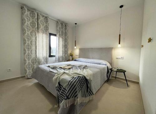 Postel nebo postele na pokoji v ubytování Can Candiu Establecimiento de 2 casas enteras