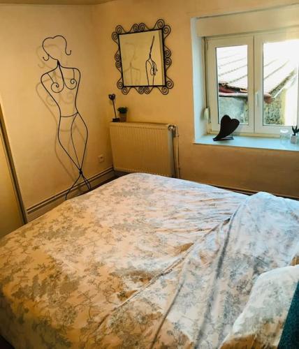 Posteľ alebo postele v izbe v ubytovaní Appartement au calme 4 pers. dans maison lorraine rénovée
