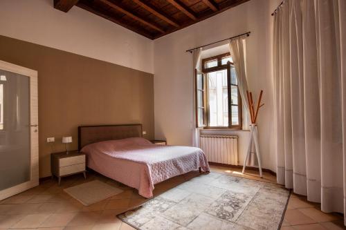 A bed or beds in a room at CasaLonghi