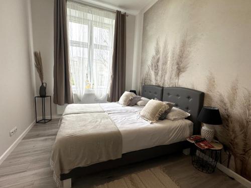 Katil atau katil-katil dalam bilik di Apartament Wroclawia