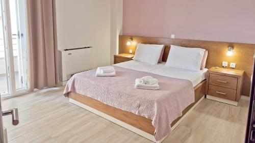 A bed or beds in a room at Sea Sparkle 1b