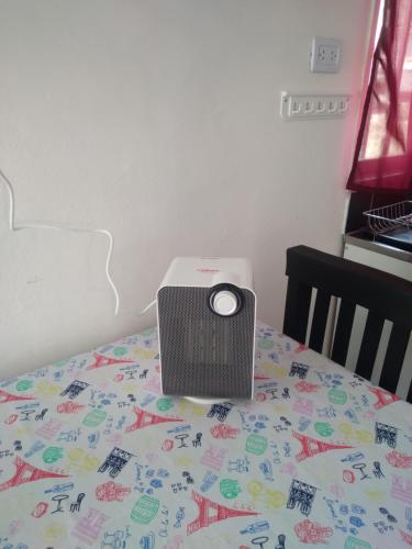 a laptop computer sitting on top of a bed at Cuesta de san miguel in Chilecito