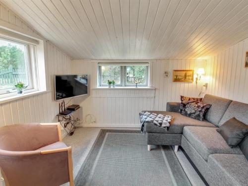 Coin salon dans l'établissement Holiday Home Wimmer - 800m from the sea in Western Jutland by Interhome