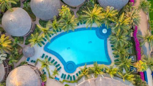 Bazén v ubytování Movenpick Resort Lamantin Saly nebo v jeho okolí