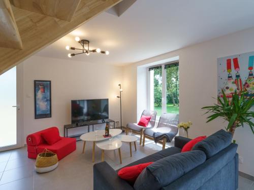 TV a/nebo společenská místnost v ubytování Holiday Home Penhors by Interhome