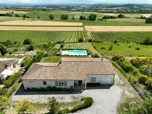 an aerial view of a house in a vineyard at Holiday Home Le Rossignol by Interhome in Cailhau