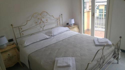 Postel nebo postele na pokoji v ubytování Casa Carla