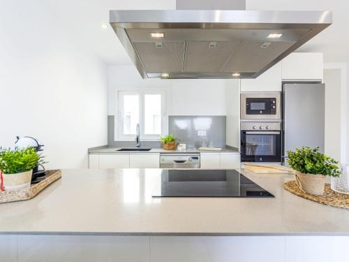 Kuchyň nebo kuchyňský kout v ubytování Apartment Apto Lluis by Interhome