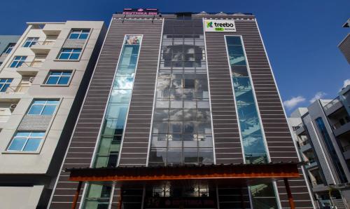 a view of the front of a building at Treebo Trend Kruthika Inn in Hyderabad