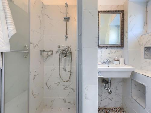 a bathroom with a shower and a sink at Holiday Home Di Nelo by Interhome in Labin