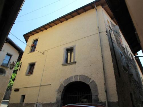 a building with an archway in front of a building at Studio Borghetto-1 by Interhome in Agra