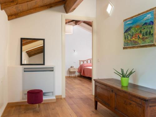 Postel nebo postele na pokoji v ubytování Holiday Home Il Fienile by Interhome