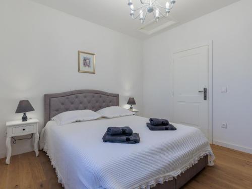 Postel nebo postele na pokoji v ubytování Holiday Home KLM by Interhome