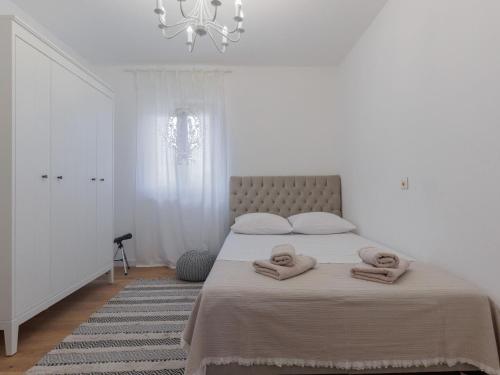 Postel nebo postele na pokoji v ubytování Holiday Home KLM by Interhome