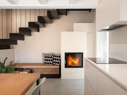 a fireplace in the living room of a house at Holiday Home Casa Maria by Interhome in Spert