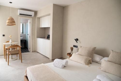 Кровать или кровати в номере Boho Suites Formentera