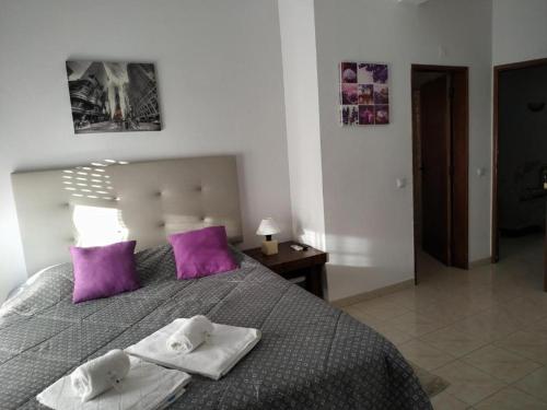 Letto o letti in una camera di AL "Hospedaria Por do sol" Sunset Olhao