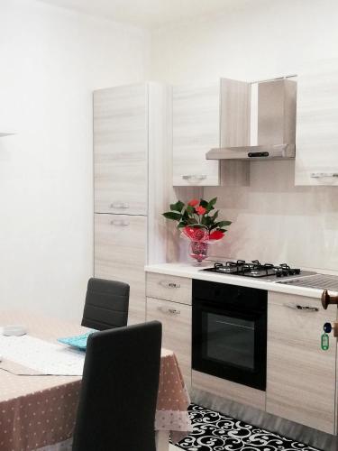 Η κουζίνα ή μικρή κουζίνα στο Casa Cinzia diamond 104