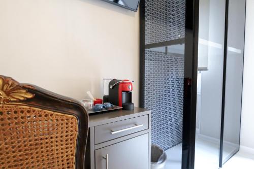 Kuchyň nebo kuchyňský kout v ubytování Hermitage Suites