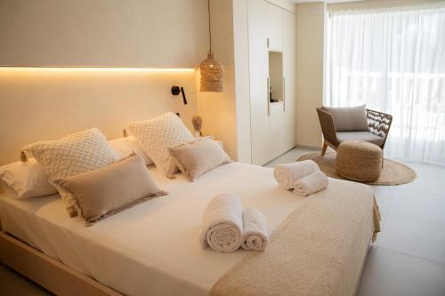 Кровать или кровати в номере Boho Suites Formentera