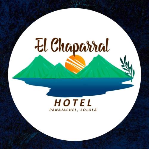een logo voor een hotel met bergen op de achtergrond bij Hotel Chaparral in Panajachel