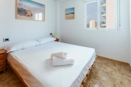 Postel nebo postele na pokoji v ubytování Apartamento Costa de Marfil Touriplaya a 200 metros del mar SOLO FAMILIAS