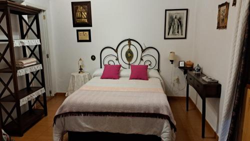 Ένα ή περισσότερα κρεβάτια σε δωμάτιο στο Casa Santana Segura