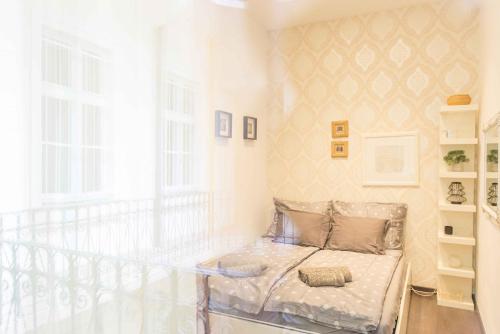 Paulay Design Apartmentにあるベッド