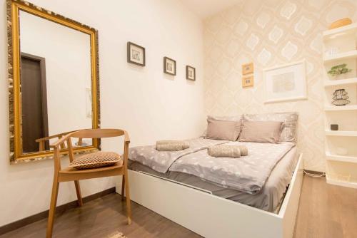 Postel nebo postele na pokoji v ubytování Paulay Design Apartment