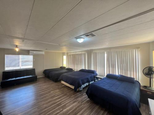 Llit o llits en una habitació de Preciosa casa para 10 personas