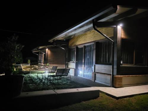 a house lit up at night with a patio at Casa MaLa’ in Ceprano